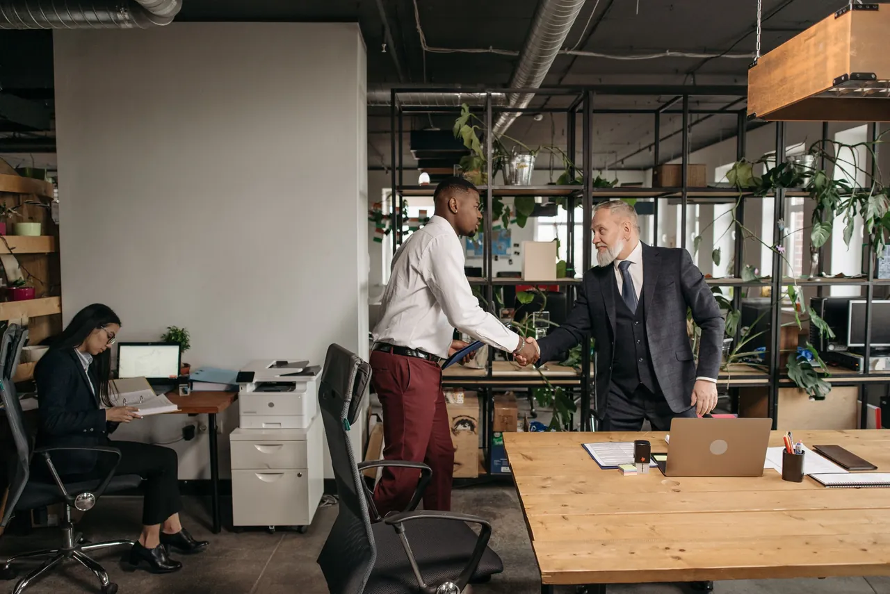 Our team meeting clients in the office